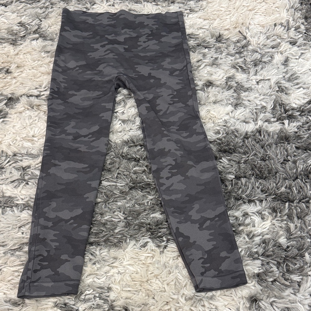 Spanx Look At Me Now Seamless Leggings in the charcoal camouflage pattern.